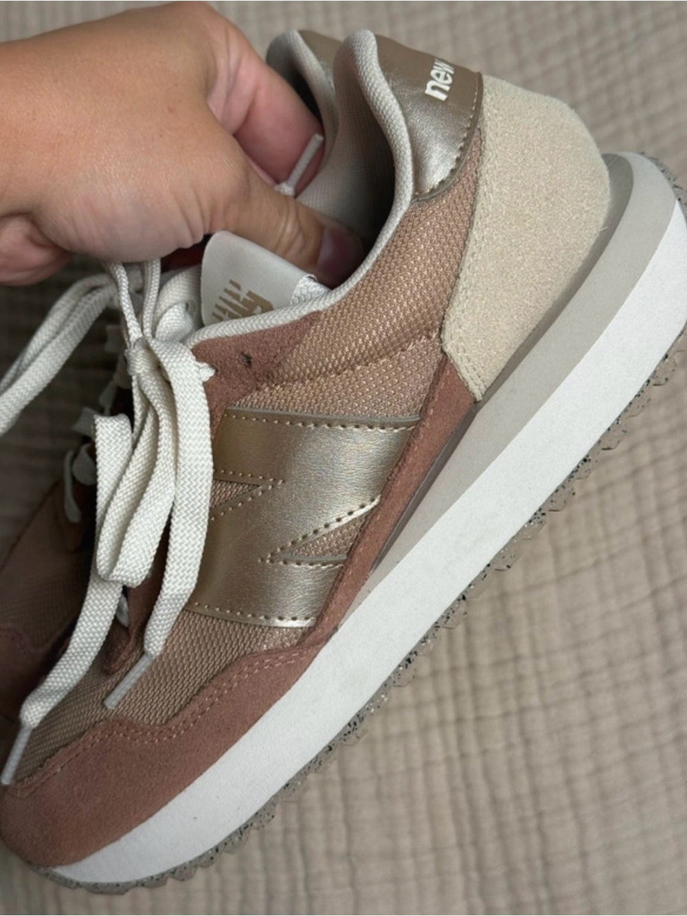 New Balance Women's Sneakers in Blush Metallic and Cream